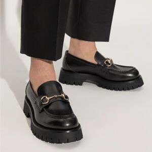 Gucci Black Leather Playform Sole Loafers with Gold Accent